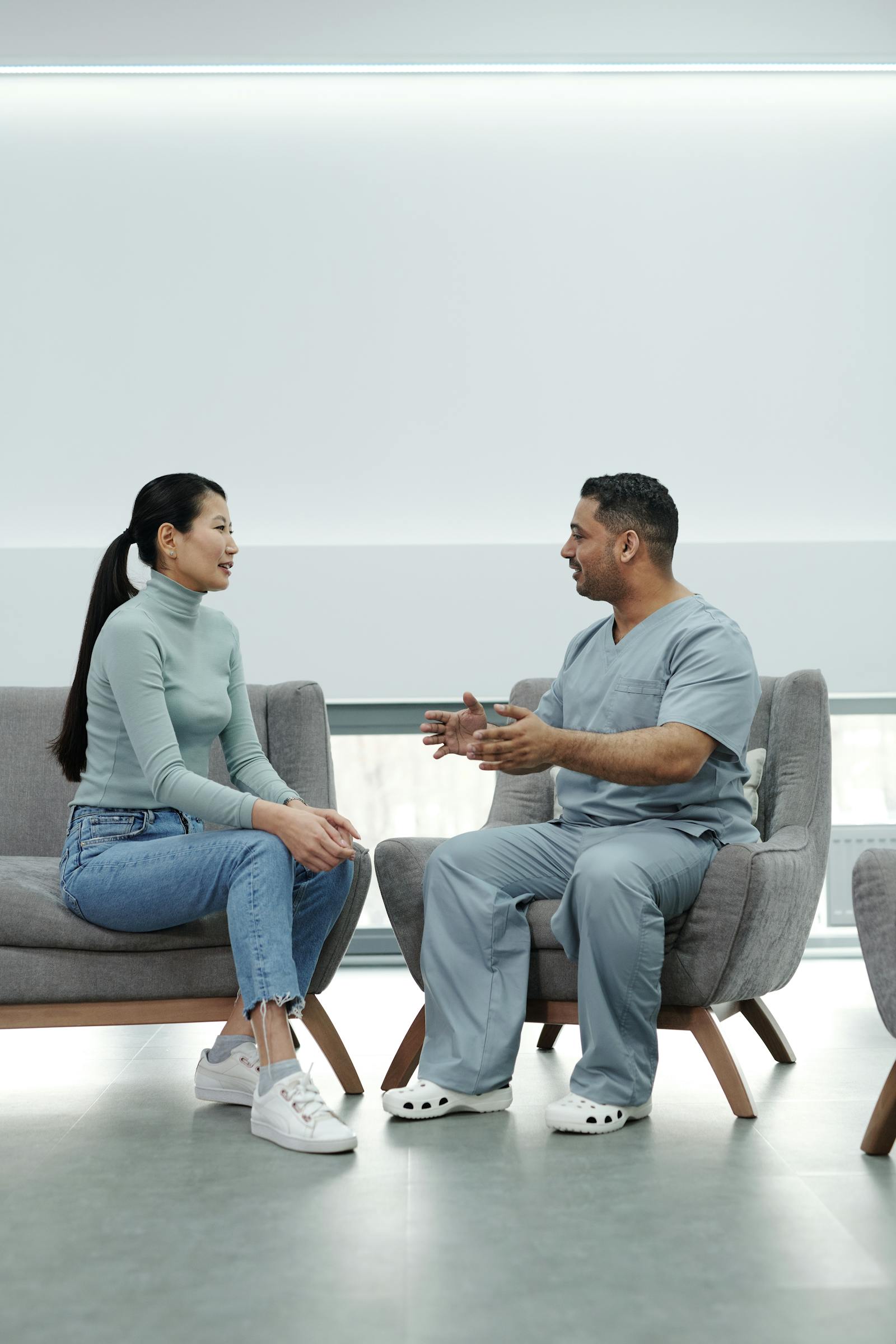 Clinician and patient reviewing aftercare instructions before travel