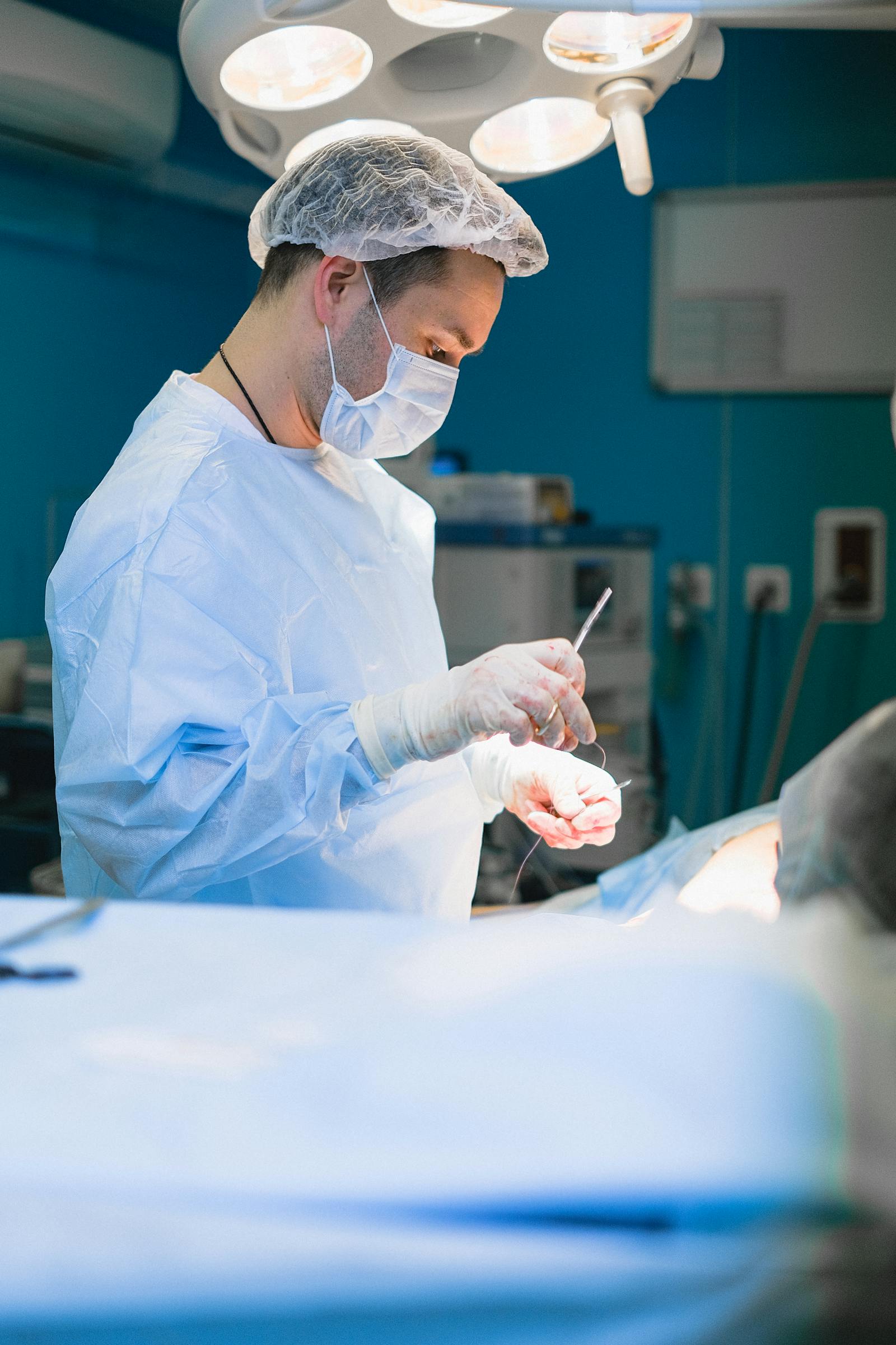 Surgical team and operating environment used to explain anesthesia and infection-control verification