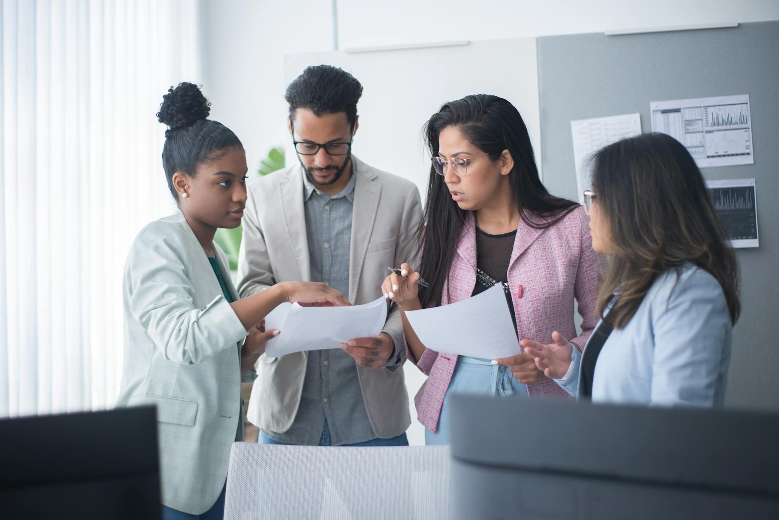 Verified Surgeons departments reviewing a case together