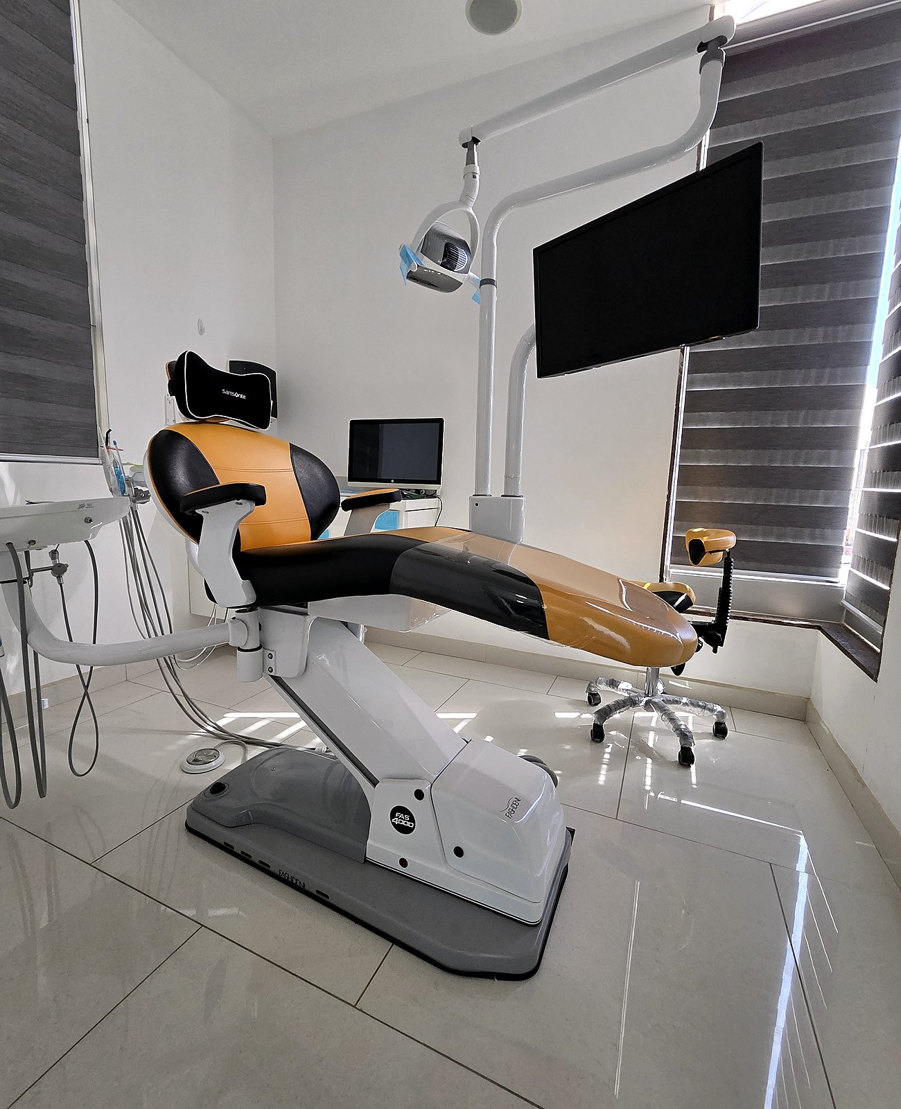 Private dental operatory used for implant and cosmetic restoration care.